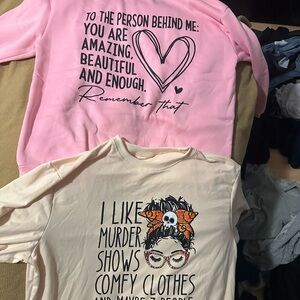 Two Large adult Graphic sweaters